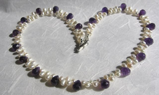 Fresh water pearl and amethyst drops, sterling silver heart toggle clasp.
